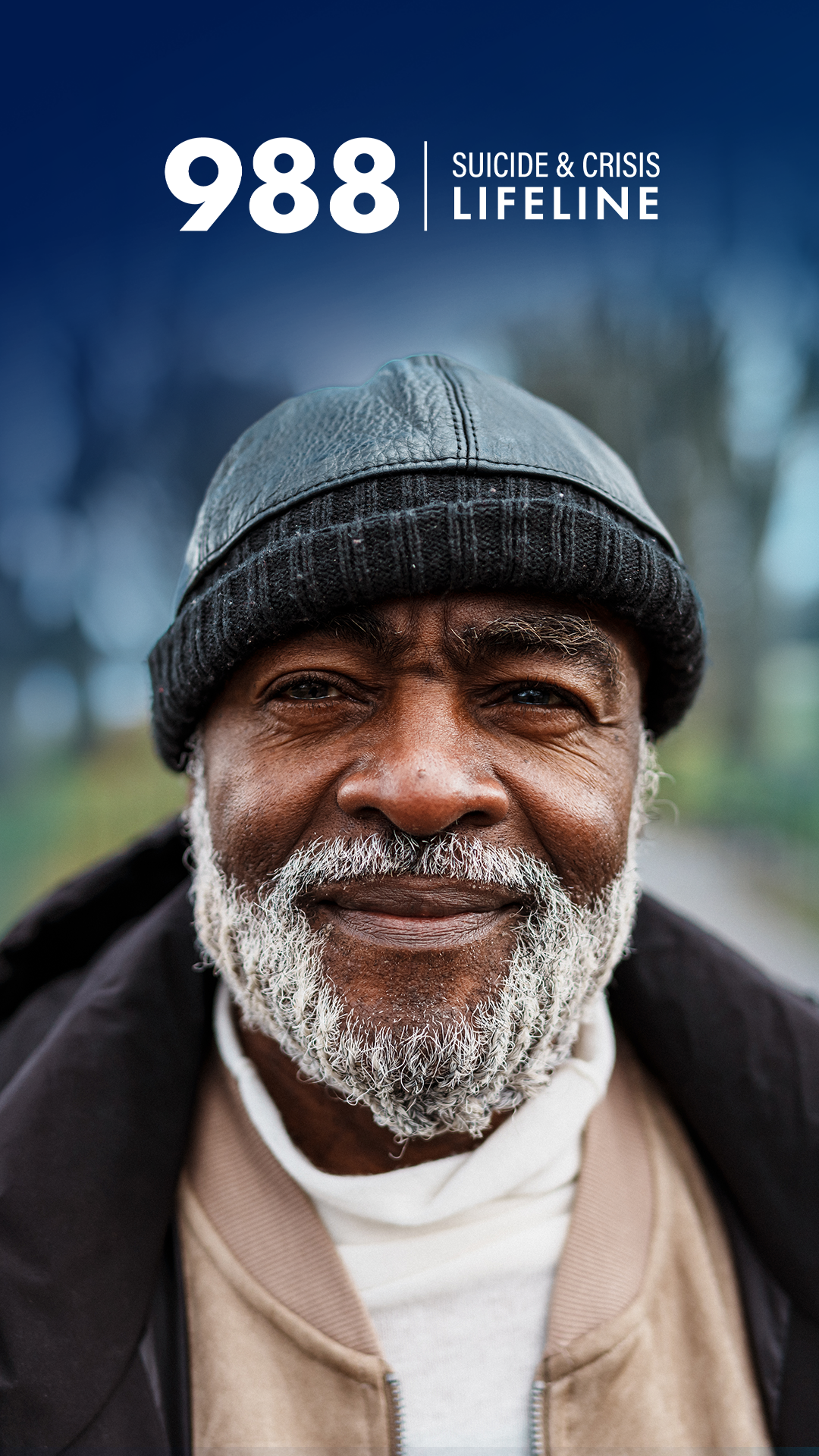 988-older-man-outside-outside-hat-vertical